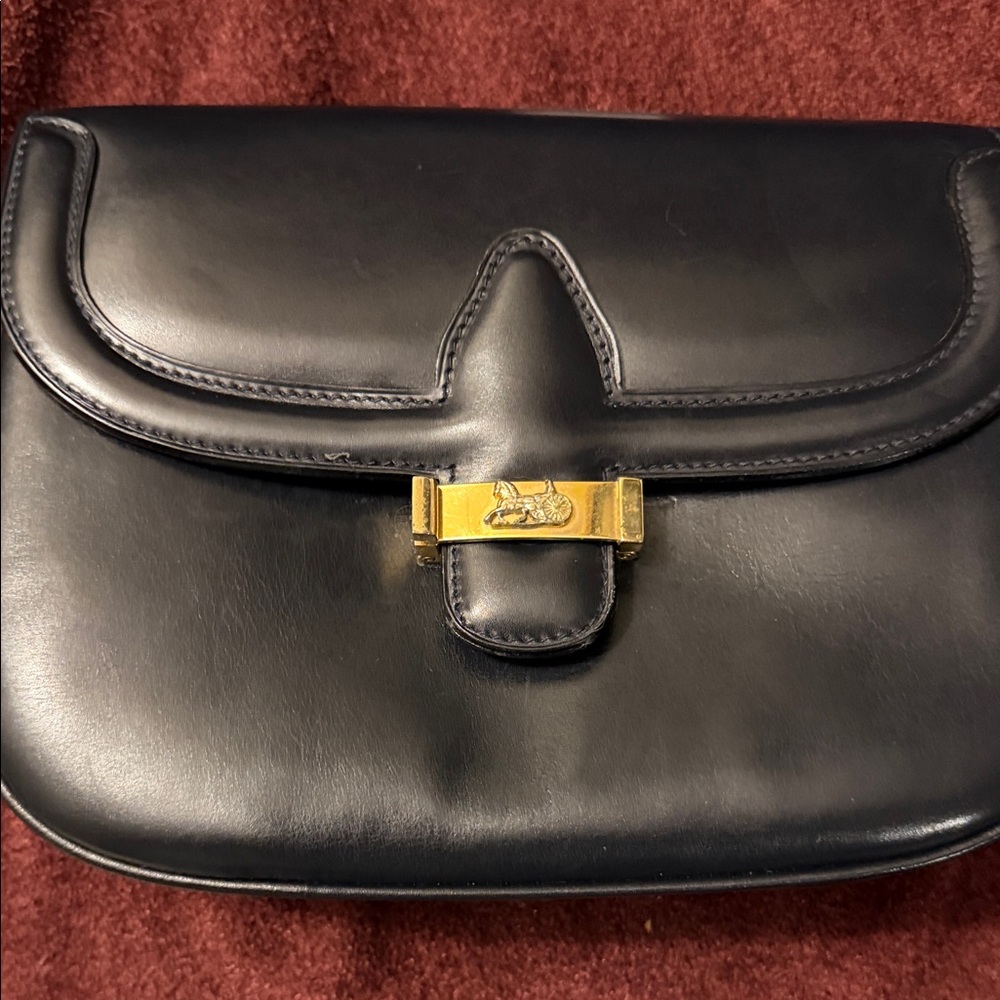 Vintage CELINE Black leather 7” x 9.5” good condition.